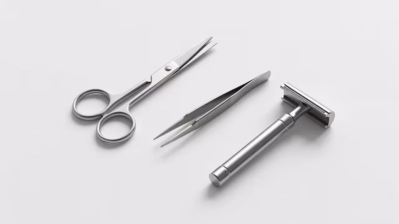 At-home nipple hair removal tools including scissors and tweezers